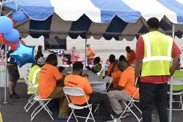 a group of people in a tent